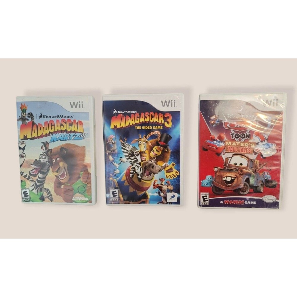 Nintendo Wii Game Lot-Madagascar 3, Kartz, Cars Toon Mater's Tall Tales- 3 Games